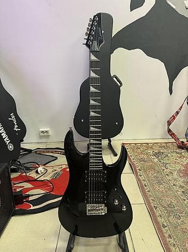 Электрогитара типа Warlock и Soloist. Выглядит эффектно. Звук мощный