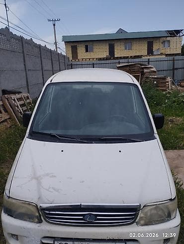 купэ: Daihatsu Move: 2003 г., Автомат, Бензин, Купе — 3