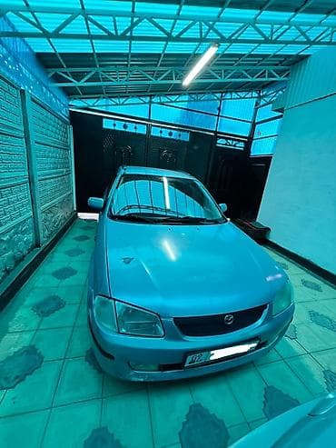 мазда хронос: Mazda 323: 2000 г., 1.5 л, Механика, Бензин, Хэтчбэк — 6