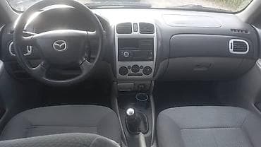 ключи машины: Mazda 323: 2002 г., 1.6 л, Механика, Бензин, Хэтчбэк — 8