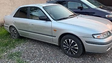Транспорт: Mazda 626: 1997 г., 1.8 л, Механика, Газ, Седан — 5