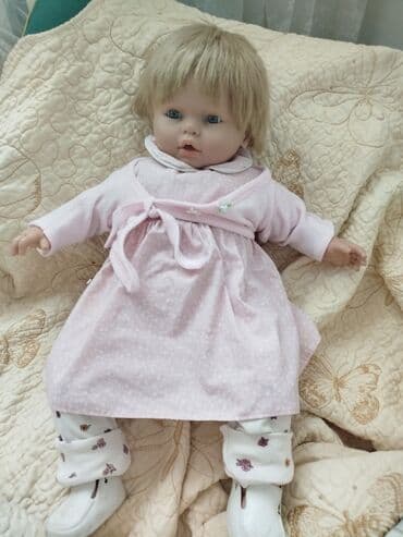 купить куклу фарфоровую: Кукла-пупс с светлыми волосами и голубыми глазами, одета в розовое — 4