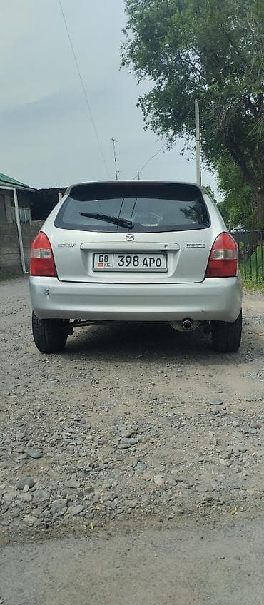 авто мазда: Mazda 323: 2001 г., 1.6 л, Механика, Газ, Универсал — 6