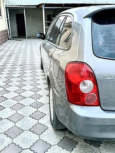 ресор масквич: Mazda 323: 2002 г., 1.6 л, Механика, Бензин, Хэтчбэк — 3