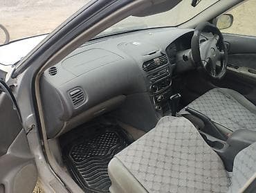 Nissan Sunny: 2000 г., 1.5 л, Автомат, Седан — 6