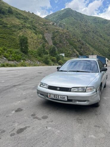 домкрат для машины: Mazda 626: 1993 г., 1.9 л, Механика, Бензин, Хетчбек — 1