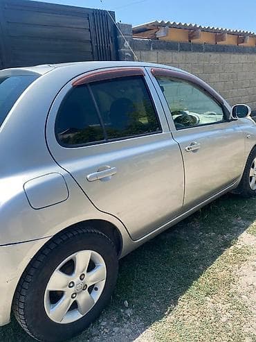 byd e6: Nissan March: 2002 г., 1.4 л, Автомат, Бензин, Хэтчбэк — 6