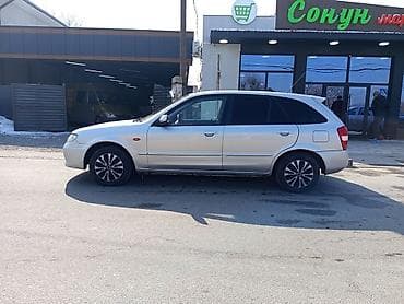 kia clarus: Mazda 323: 2001 г., 1.6 л, Ручные, Бензин, Универсал — 3