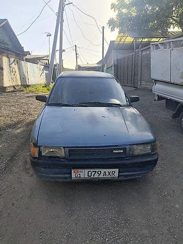 Продажа авто: Mazda 323: 1990 г., 1.5 л, Механика, Бензин, Седан — 5