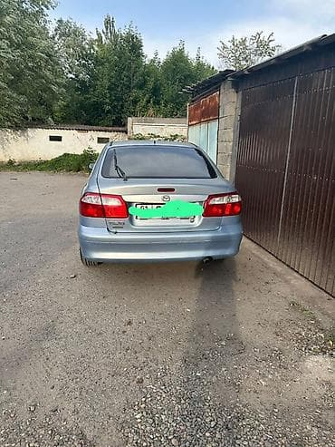 Транспорт: Mazda 626: 2000 г., 2 л, Механика, Бензин, Хэтчбэк — 3