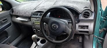 можна в рассрочку: Mazda Demio: 2003 г., Бензин — 7
