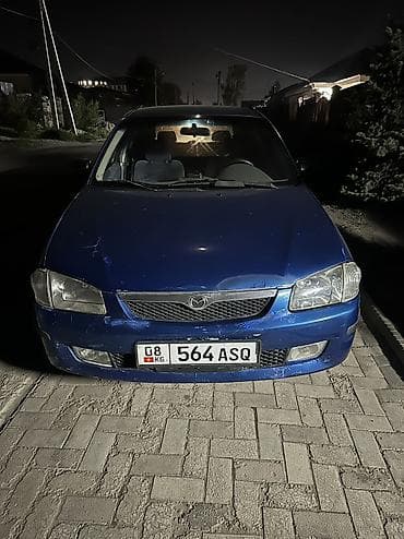 Mazda 323: 1999 г., 1.6 л, Механика, Бензин, Хэтчбэк