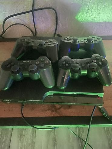 Игровая приставка Sony PlayStation 3 (модель с дисководом спереди) в