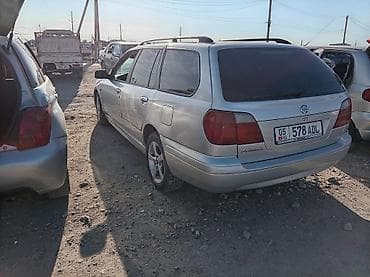 водный аппарат: Nissan Primera: 2001 г., 0.2 л, Механика, Бензин, Универсал — 4