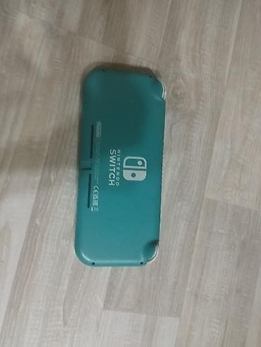 Nintendo Switch (Lite): Nintendo Switch Lite — голубого цвета | 15 000 сом Продаю Nintendo — 1