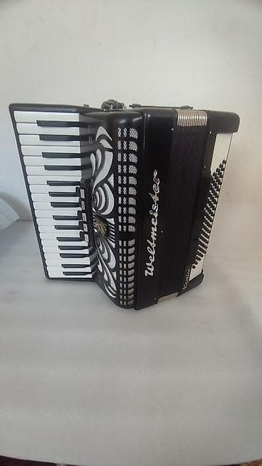 Аккордеон Weltmeister Consul (клавишный аккордеон, «пианино») -