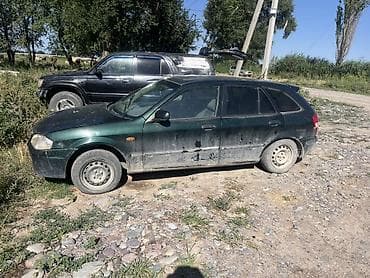 Продажа авто: Mazda Familia: 1998 г., Механика, Бензин, Универсал — 4