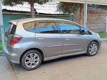 Транспорт: Honda Fit: 2009 г., 1.5 л, Автомат, Бензин, Хэтчбэк — 2