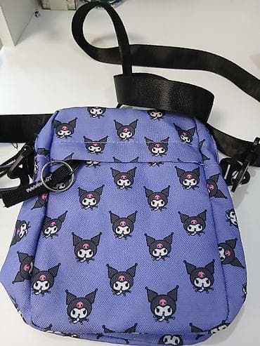 Небольшая кросс-боди/сумка через плечо с принтом Kuromi на сиреневом at lalafo.kg Небольшая кросс-боди/сумка через плечо с принтом Kuromi на сиреневом