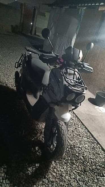 can am: Скутер-адвенчер с внедорожным обвесом - Двухфарная передняя оптика в — 1