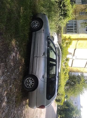 портер капот: Nissan Primera: 2001 г., 1.8 л, Универсал — 7
