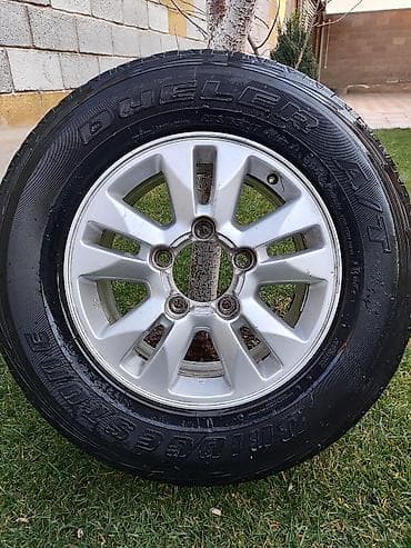 Шиналар 275 / 65 / R 17, All-season, Колдонулган, Камдык, Жол тандабастар (АТ/МТ), Жапония, Bridgestone