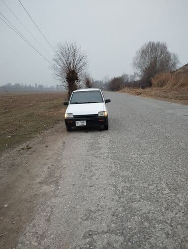 продажа авто матиз: Белый пятидверный хэтчбек Daewoo Tico, оснащенный черными пластиковыми — 6