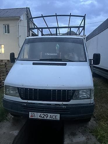 Унаа: Грузовой бортовой фургон Mercedes-Benz Sprinter (кабина с правым рулем — 1