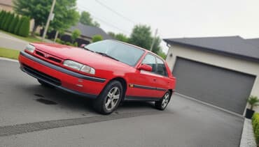 mazda: Mazda 323: 1994 г., 1.6 л, Механика, Хэтчбэк — 1