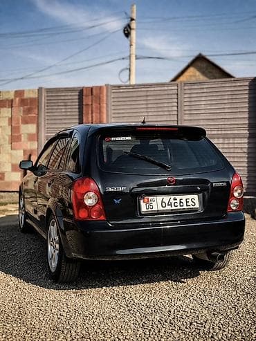 x 5: Mazda 323: 2003 г., 1.6 л, Хэтчбэк — 3