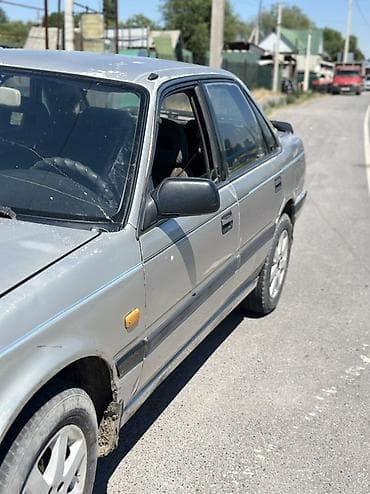 210 mers: Mazda 626: 1988 г., 2.2 л, Механика, Бензин, Седан — 1