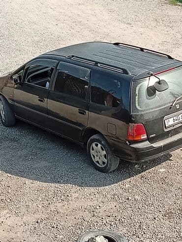 Honda : 1995 г., 2.3 л, Автомат, Газ, Минивэн