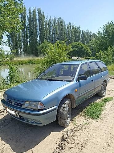 глушитель на опель зафира а: Nissan Primera: 1994 г., Механика — 1