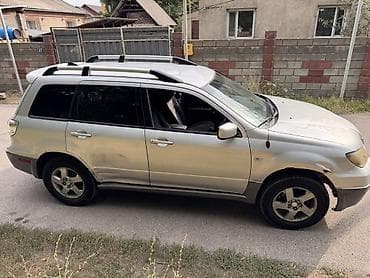 обмен на левый: Mitsubishi Outlander: 2003 г., 2.4 л, Автомат, Бензин, Кроссовер — 3