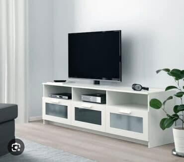 ТВ-тумба/медиатумба современного стиля в белом цвете. Особенности: -