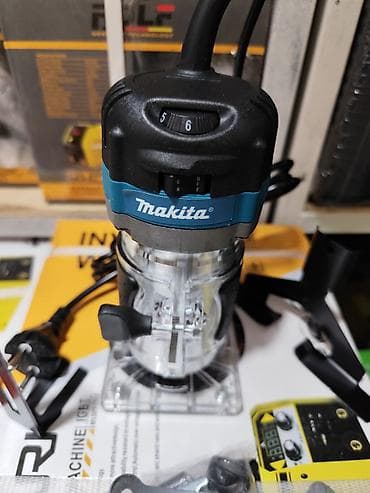 Строительное оборудование: Компактный ручной кромочный фрезер Makita BG373 - Мощность: 580 Вт - — 3