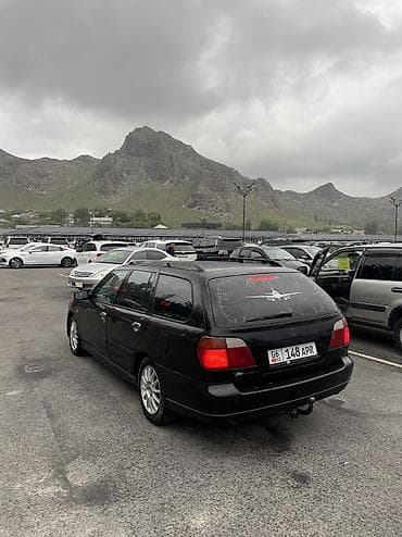 Транспорт: Nissan Primera: 2001 г., 1.8 л, Механика, Бензин, Универсал — 4