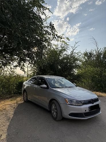 lancer 9: Volkswagen Jetta: 2013 г., 1.4 л, Автомат, Гибрид, Седан — 2