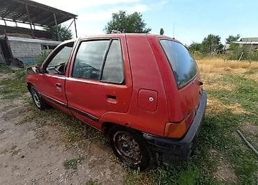 Daihatsu Charade: 1992 г., 1 л, Механика, Бензин — 4