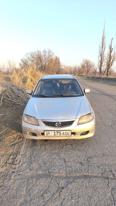бишкек авторынок 2021 год: Mazda Familia: 2001 г., 1.6 л, Механика, Бензиновая, Хэтчбэк — 7