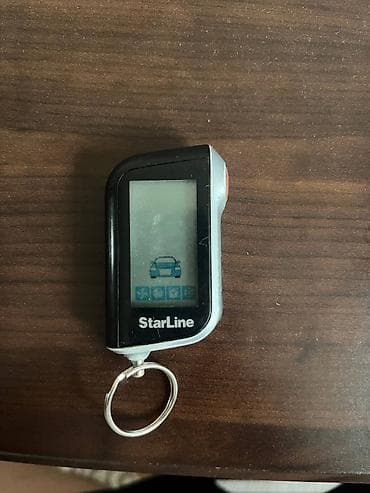 mini gps tracker: Пульт от автосигнализации StarLine с ЖК-брелоком. Комплектация: - — 2