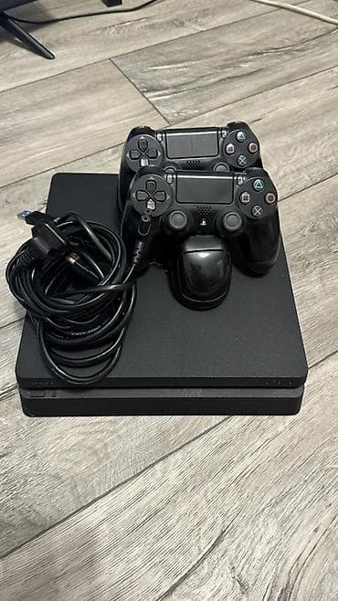 PlayStation 4 Slim 1 ТБ Комплектация: - консоль PS4 Slim (черная) - 2