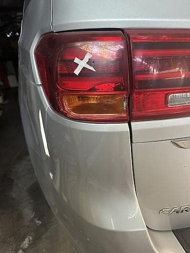 Задний левый фонарь (комбинированный) для кроссовера/универсала