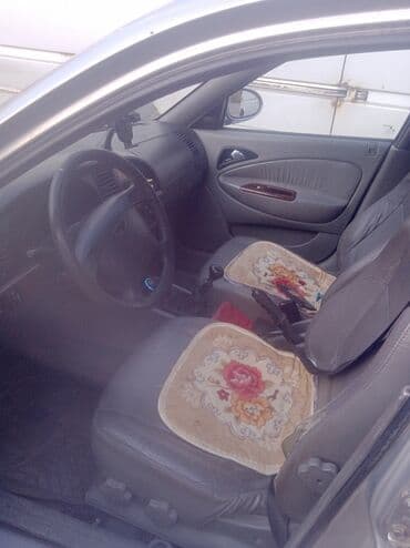 обмен на частный дом: Daewoo Nubira: 2000 г., 1.5 л, Механика, Бензин, Седан — 5