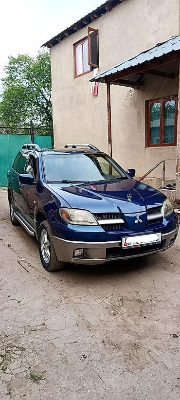 impreza wrx: Mitsubishi Outlander: 2004 г., 2 л, Механика, Бензин, Кроссовер — 1