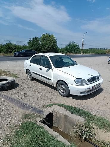 домик авто: Daewoo Lanos: 1999 г., 1.5 л, Механика, Бензин, Седан — 2