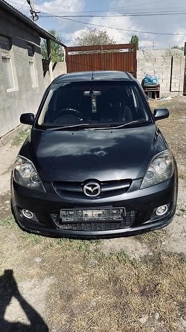Mazda Demio: 2006 г., 1.3 л, Автомат, Бензин, Хэтчбэк