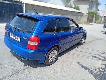 6: Mazda 323: 2001 г., 1.6 л, Механика, Бензин, Хэтчбэк — 1