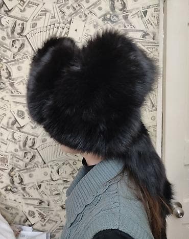 Шапка-ушанка — это головной убор из меха или шерсти, скроенный таким