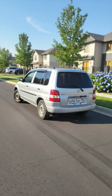 срочно продаю в связи с переездом: Mazda Demio: 2001 г., 1.3 л, Автомат, Бензин, Универсал — 1